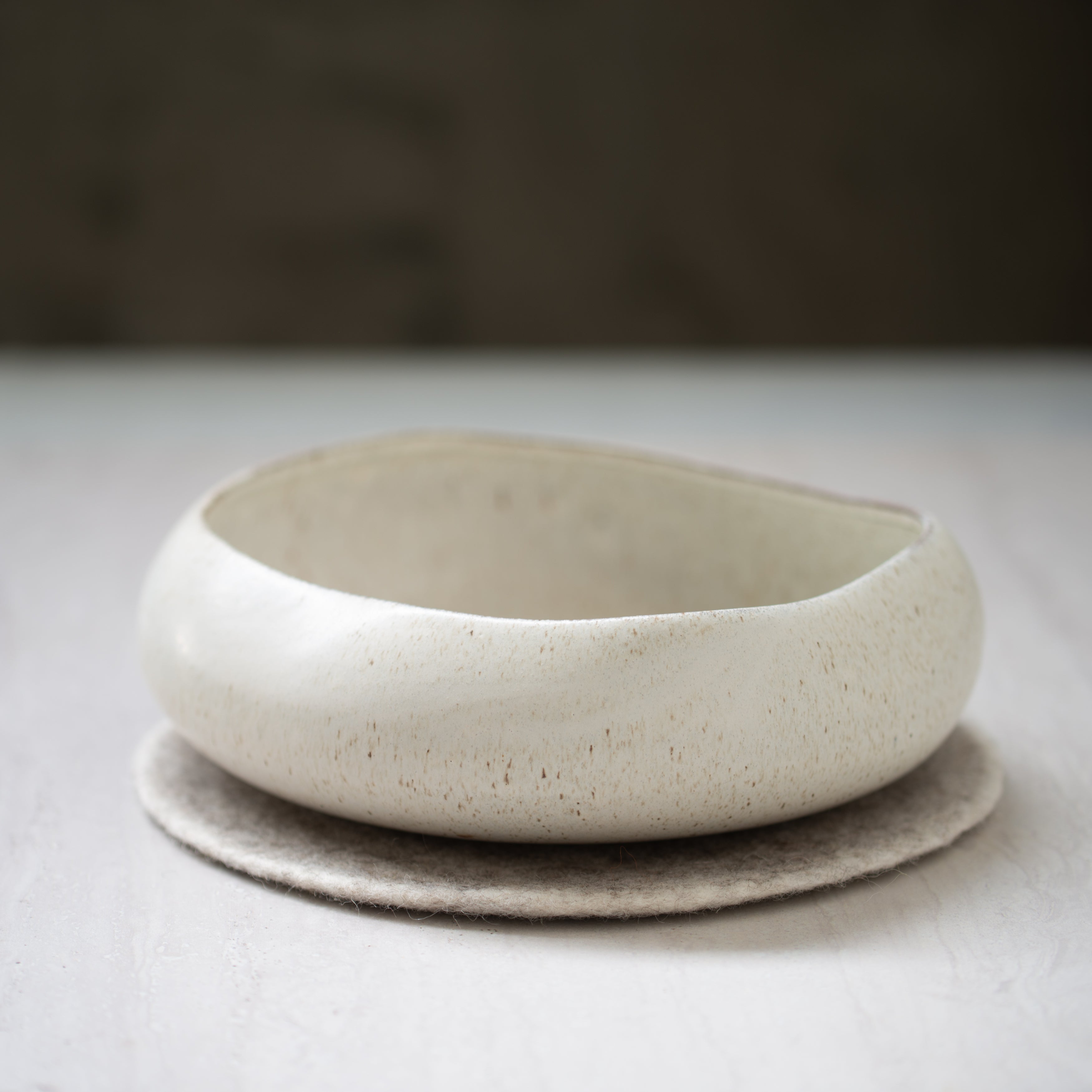 Muskhane Wool Felt Trivet | Light Stone + Natural
