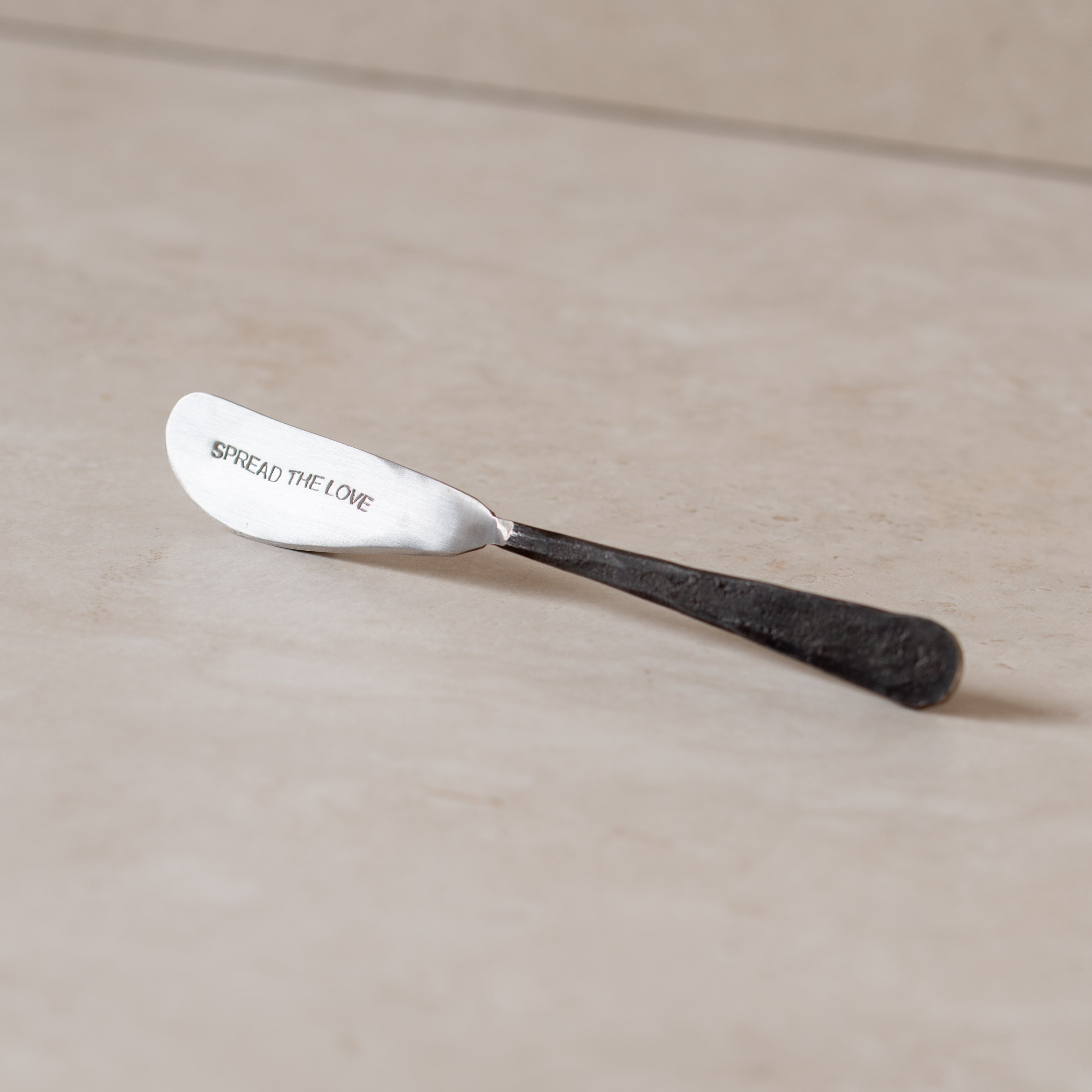 Embossed Iron Spreader | Spread the Love