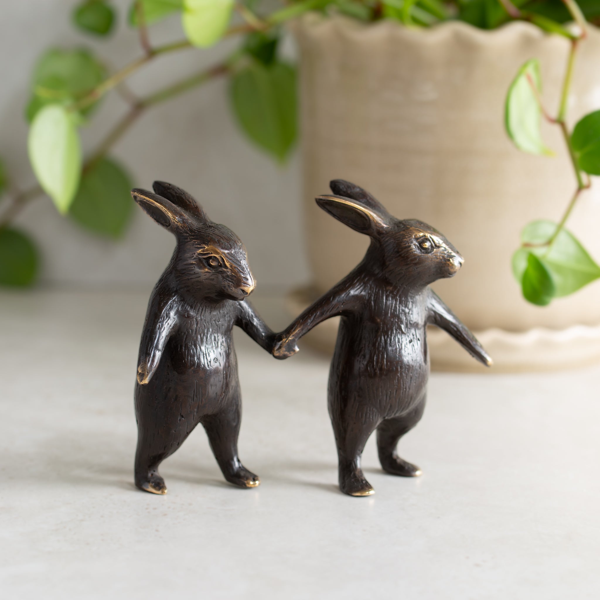 Little Bronze Walking Rabbits