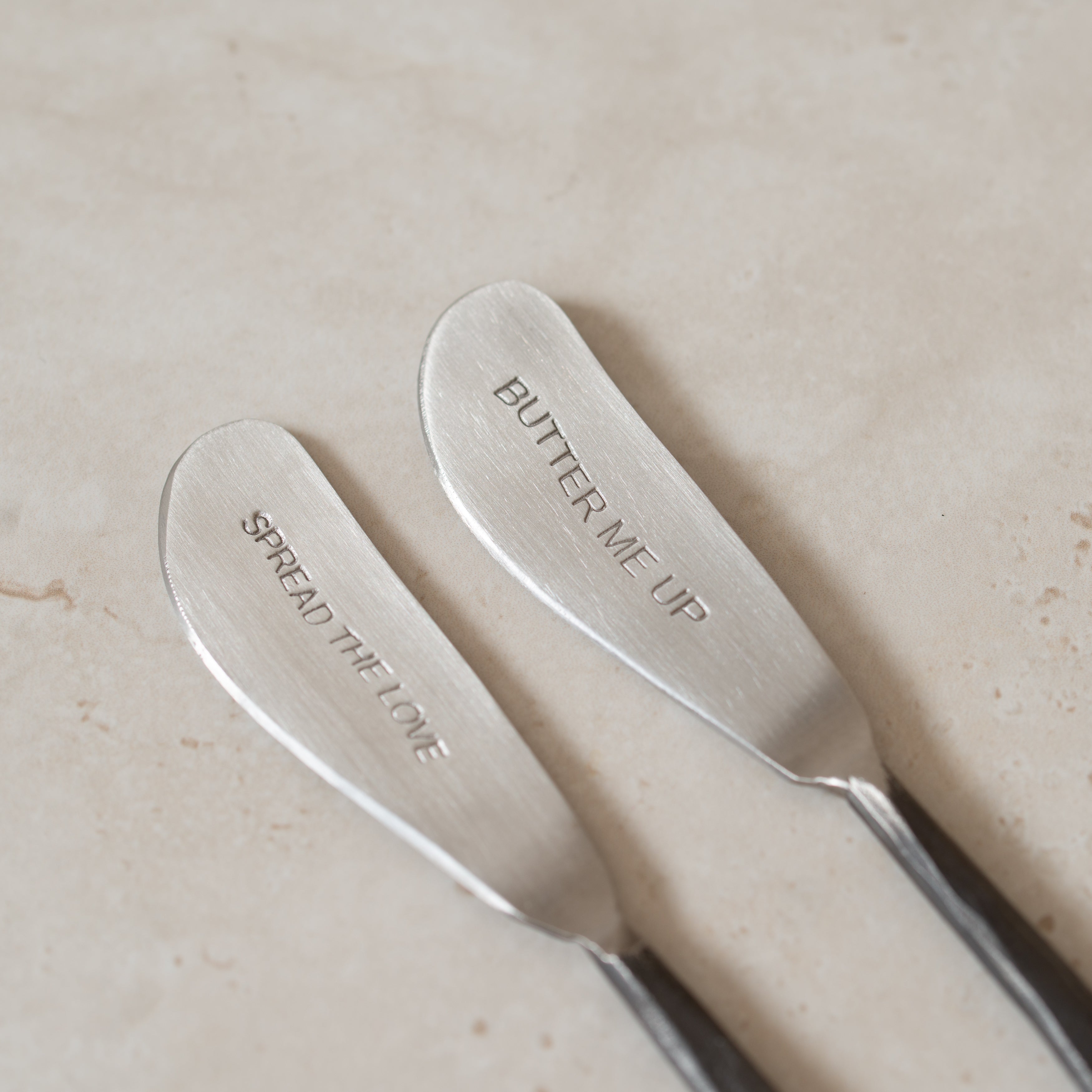 Embossed Iron Spreader | Spread the Love