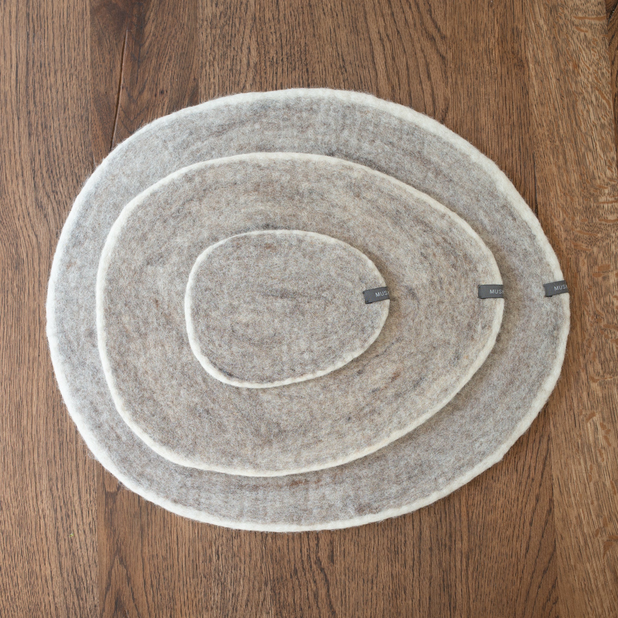 Muskhane Wool Felt Pebble Mat | Light Stone + Natural | Medium