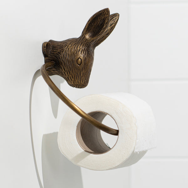 Brass Rabbit Toilet Roll Holder NZ | Antique Finish - Side view with toilet paper roll